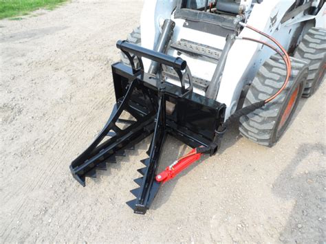 skid steer post puller attachment auction|grubbing attachment for skid loader.